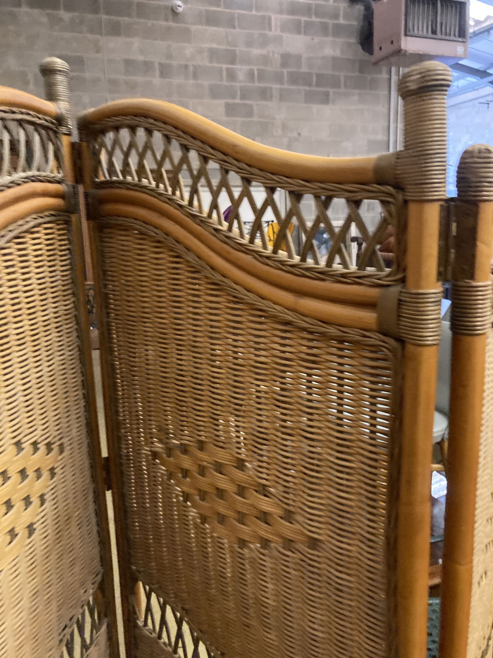 A three fold bamboo and rattan dressing screen, height 186cm